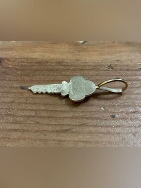 Vintage: Key to anyone heart  delicate/dainty fine 14k.yellow gold Key charm/